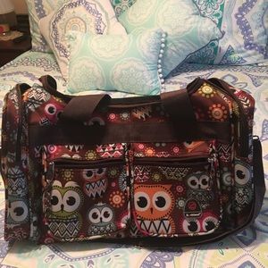 Cute small duffel bag with owl theme.